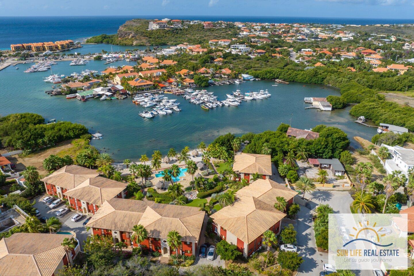 Exclusive Waterfront Apartment with Private Beach Access for Sale in Spanish Water Resort