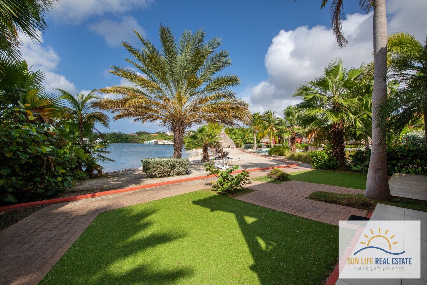 Exclusive Waterfront Apartment with Private Beach Access for Sale in Spanish Water Resort