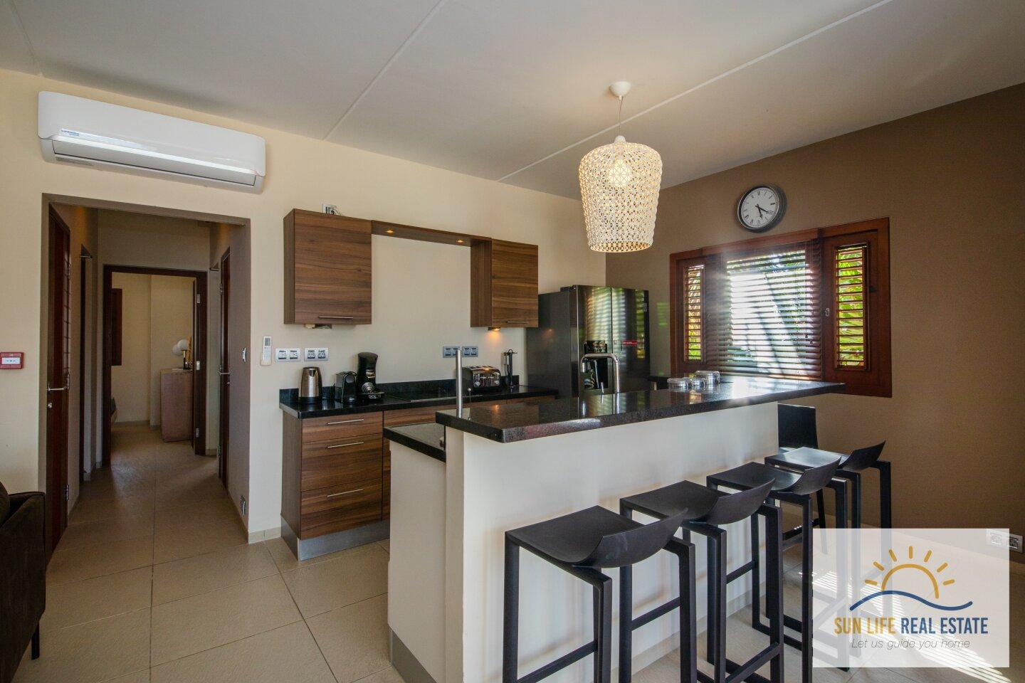 Exclusive Waterfront Apartment with Private Beach Access for Sale in Spanish Water Resort