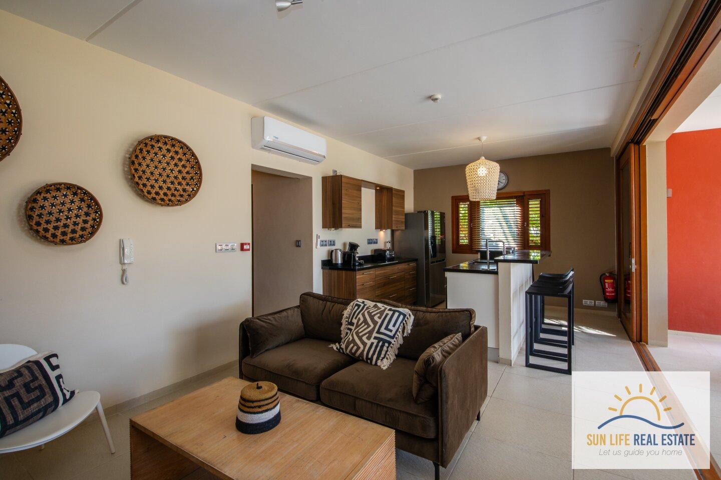 Exclusive Waterfront Apartment with Private Beach Access for Sale in Spanish Water Resort