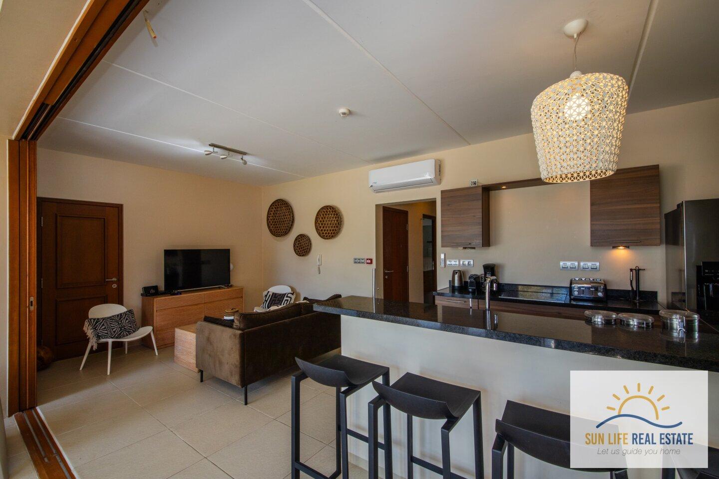 Exclusive Waterfront Apartment with Private Beach Access for Sale in Spanish Water Resort