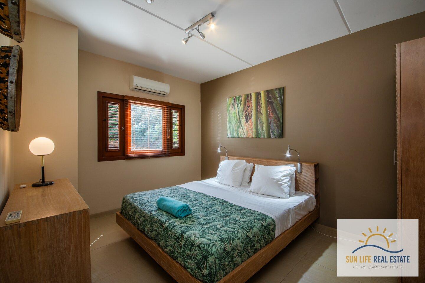 Exclusive Waterfront Apartment with Private Beach Access for Sale in Spanish Water Resort