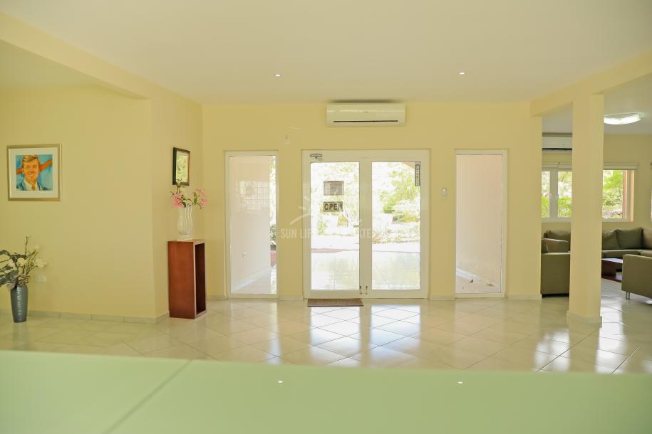 Transform This Property into Your Dream Location on a Generous 1,374 Square Meters of Owned Land!-2